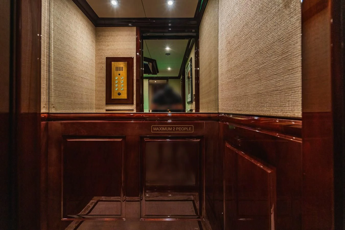 a building with a glass door aboard LADY ELAINE Yacht for Charter