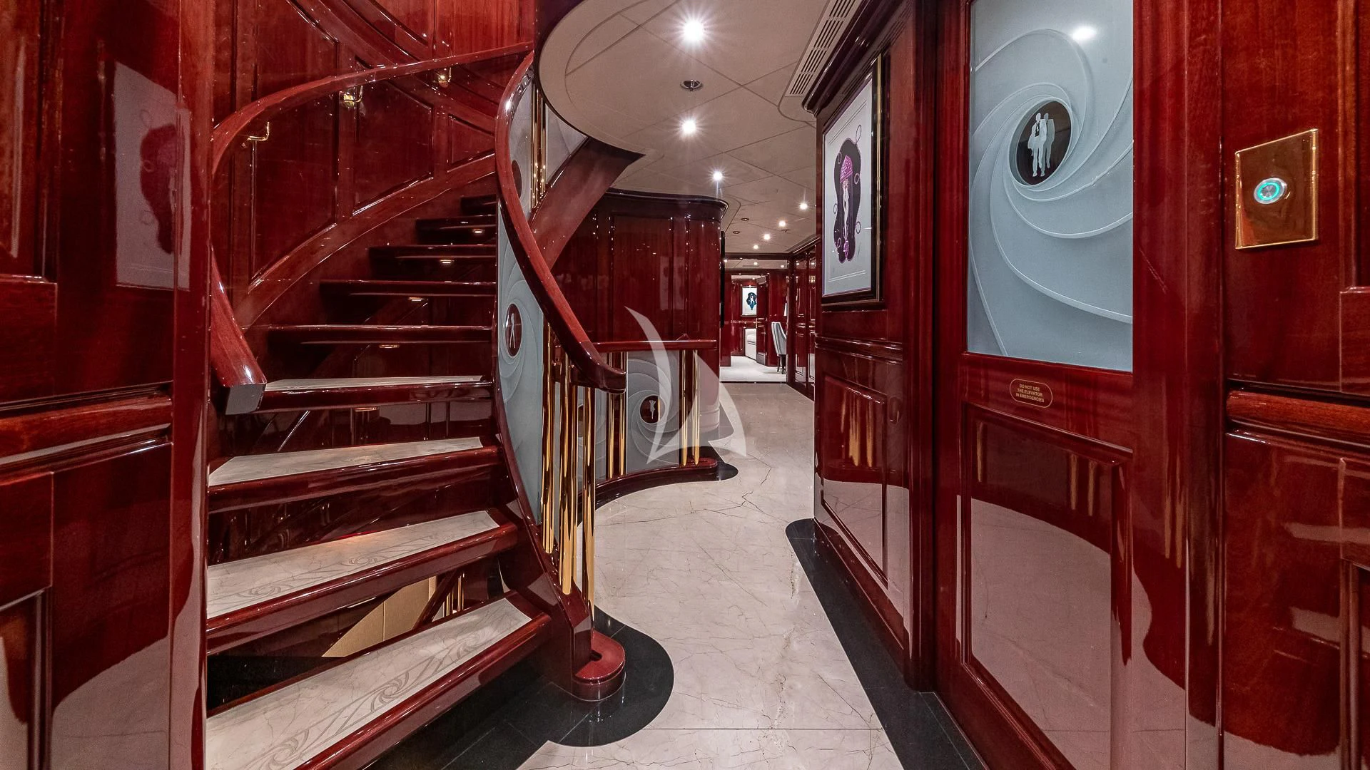 a hallway with red walls aboard LADY ELAINE Yacht for Charter