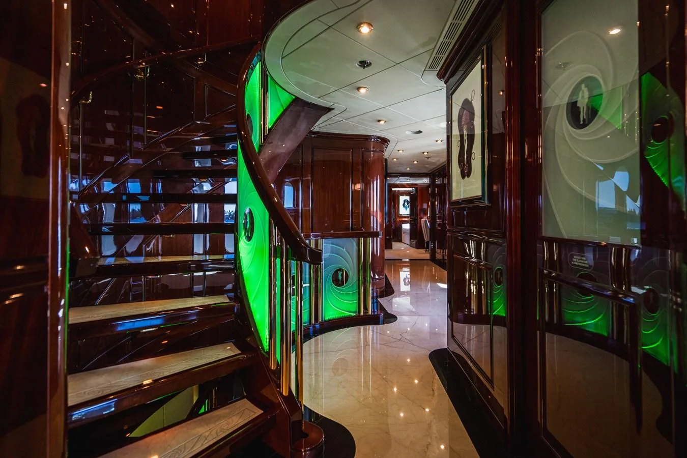 a room with a green and red flag from the ceiling aboard LADY ELAINE Yacht for Charter
