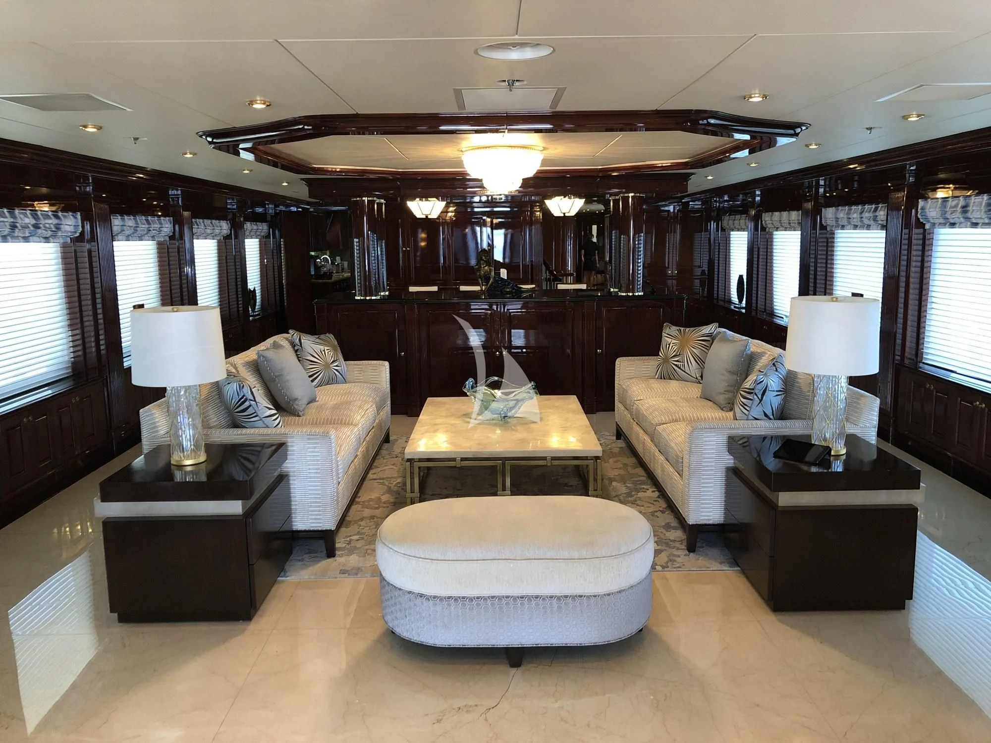 a living room with a large window aboard LADY ELAINE Yacht for Charter