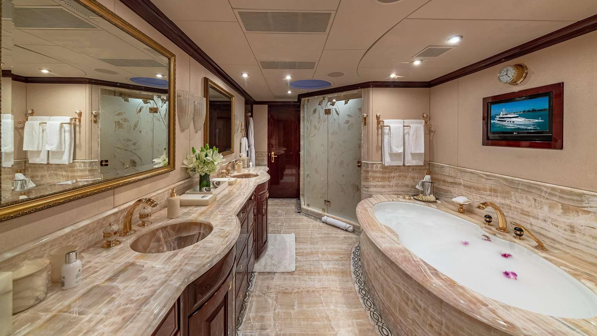 a bathroom with a large bathtub aboard LADY ELAINE Yacht for Charter