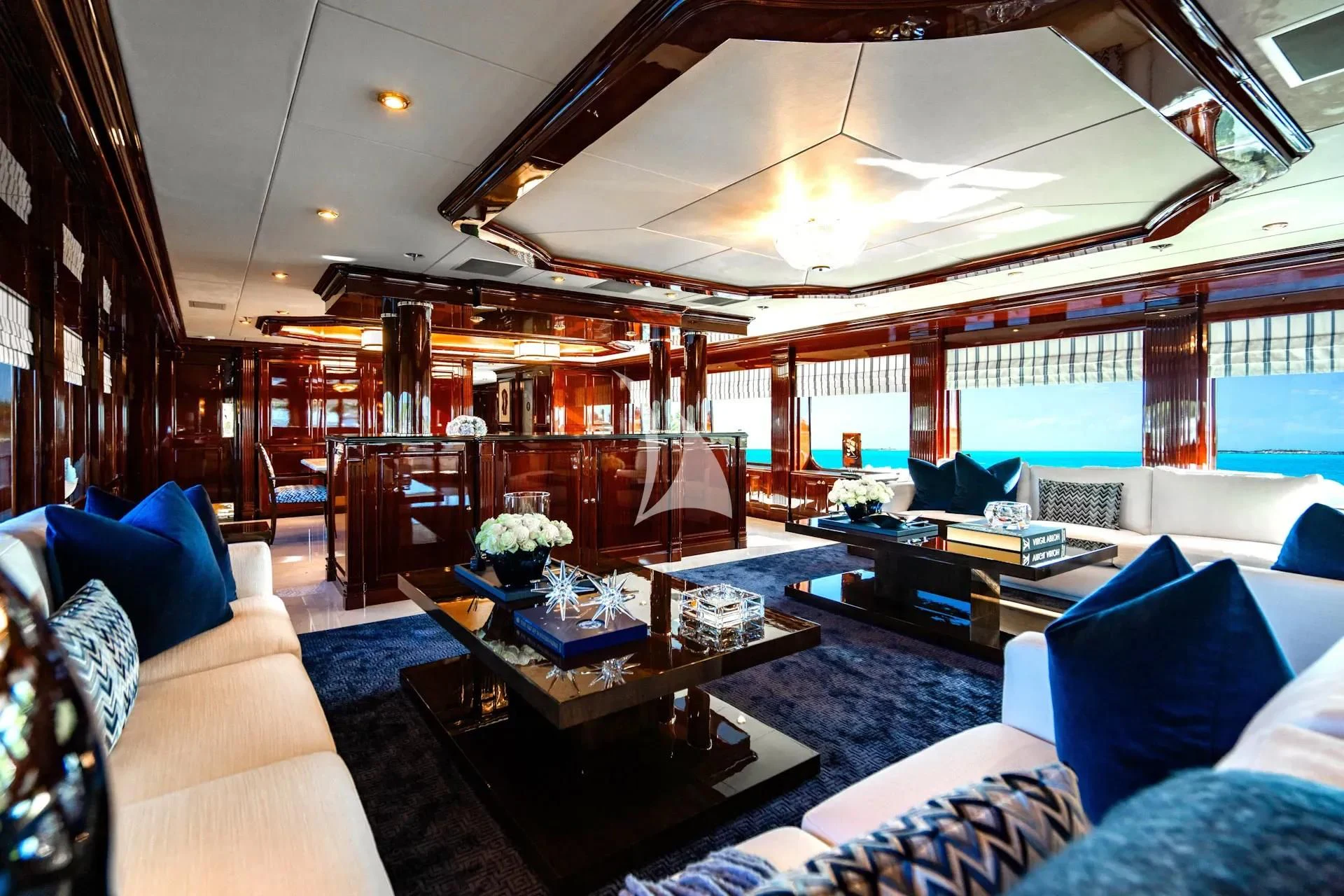 a living room with a large window aboard LADY ELAINE Yacht for Charter