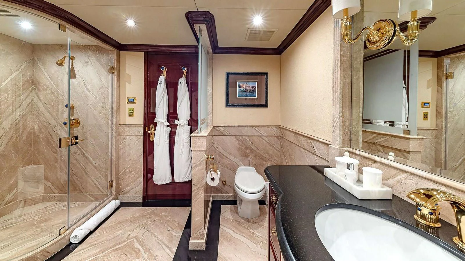 a bathroom with a large marble countertop aboard LADY ELAINE Yacht for Charter
