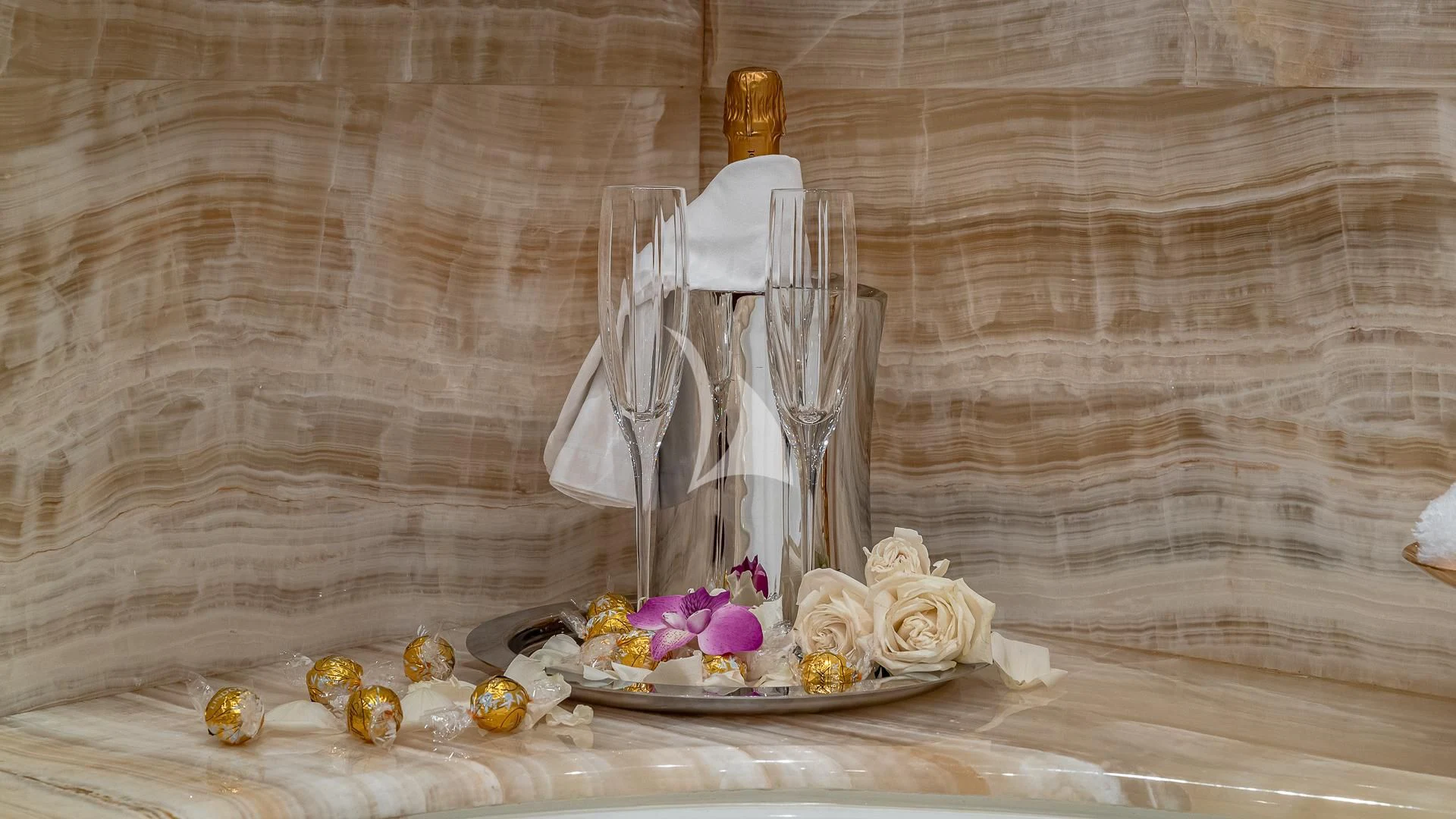 a glass bowl with food on a wooden surface aboard LADY ELAINE Yacht for Charter