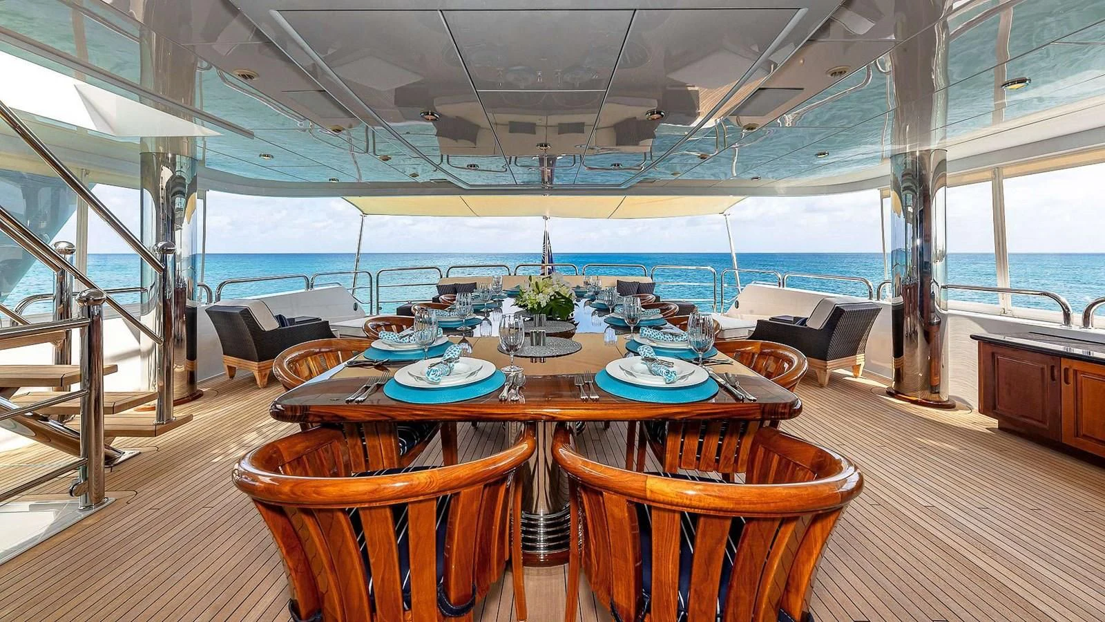 a large room with tables and chairs aboard LADY ELAINE Yacht for Charter