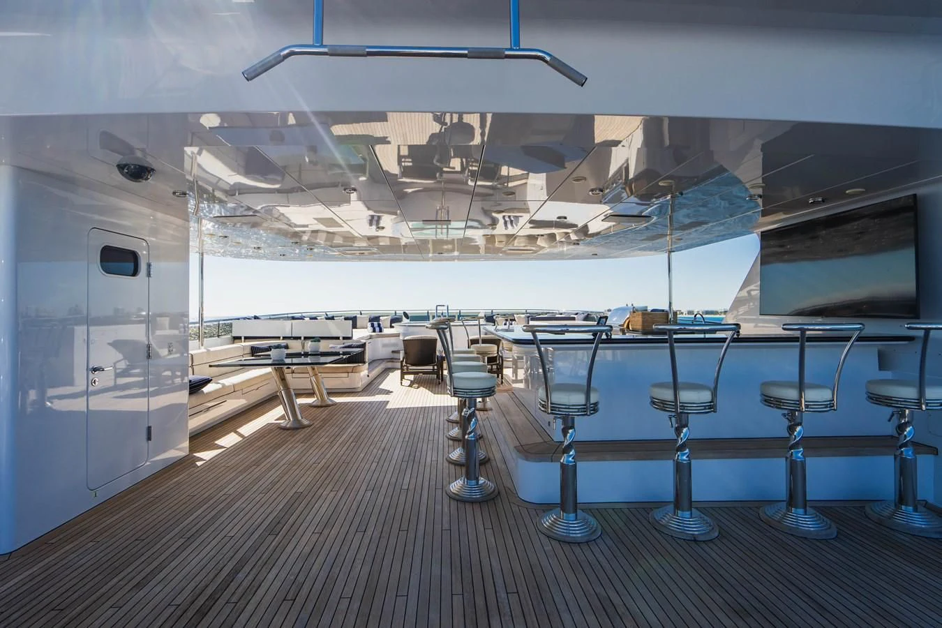a room with chairs and tables aboard LADY ELAINE Yacht for Charter