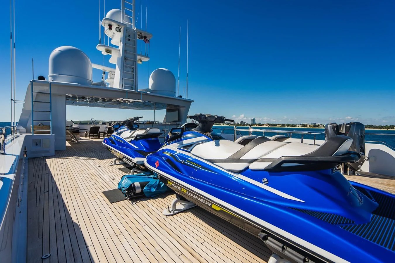 a deck with a boat and a satellite dish on it aboard LADY ELAINE Yacht for Charter
