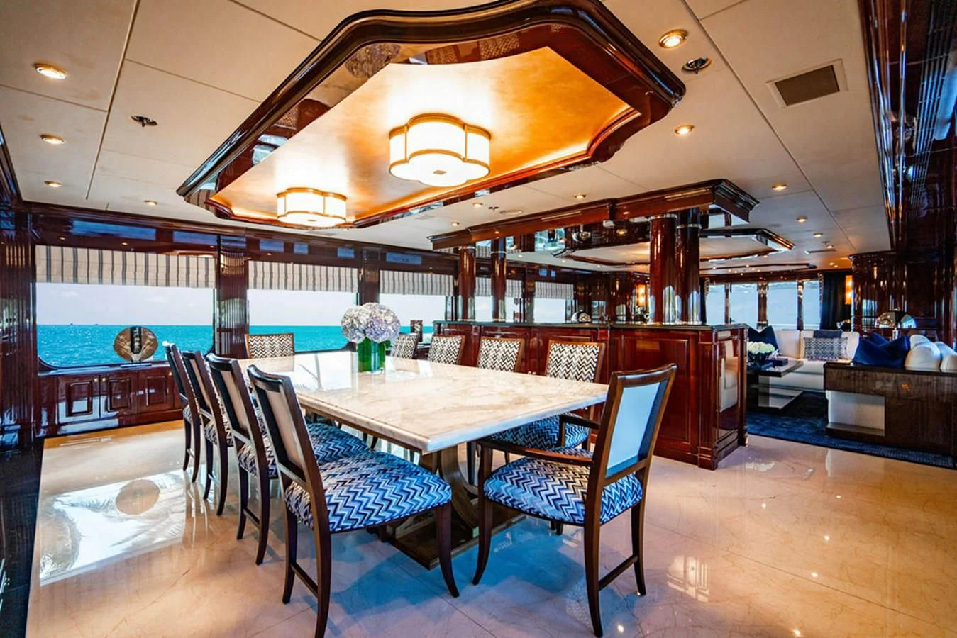 a room with a table and chairs aboard LADY ELAINE Yacht for Charter