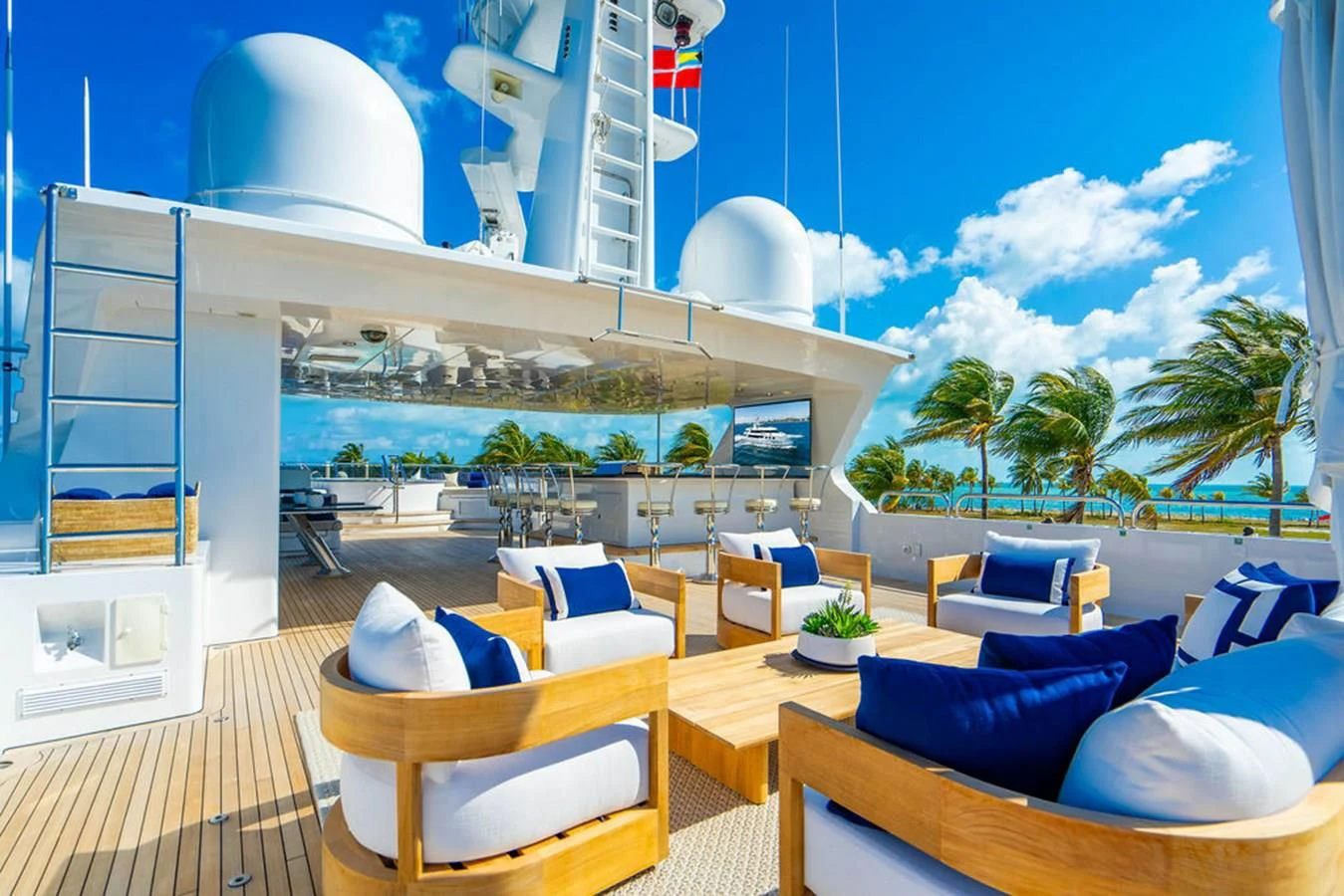 a room with a pool and lounge chairs aboard LADY ELAINE Yacht for Charter