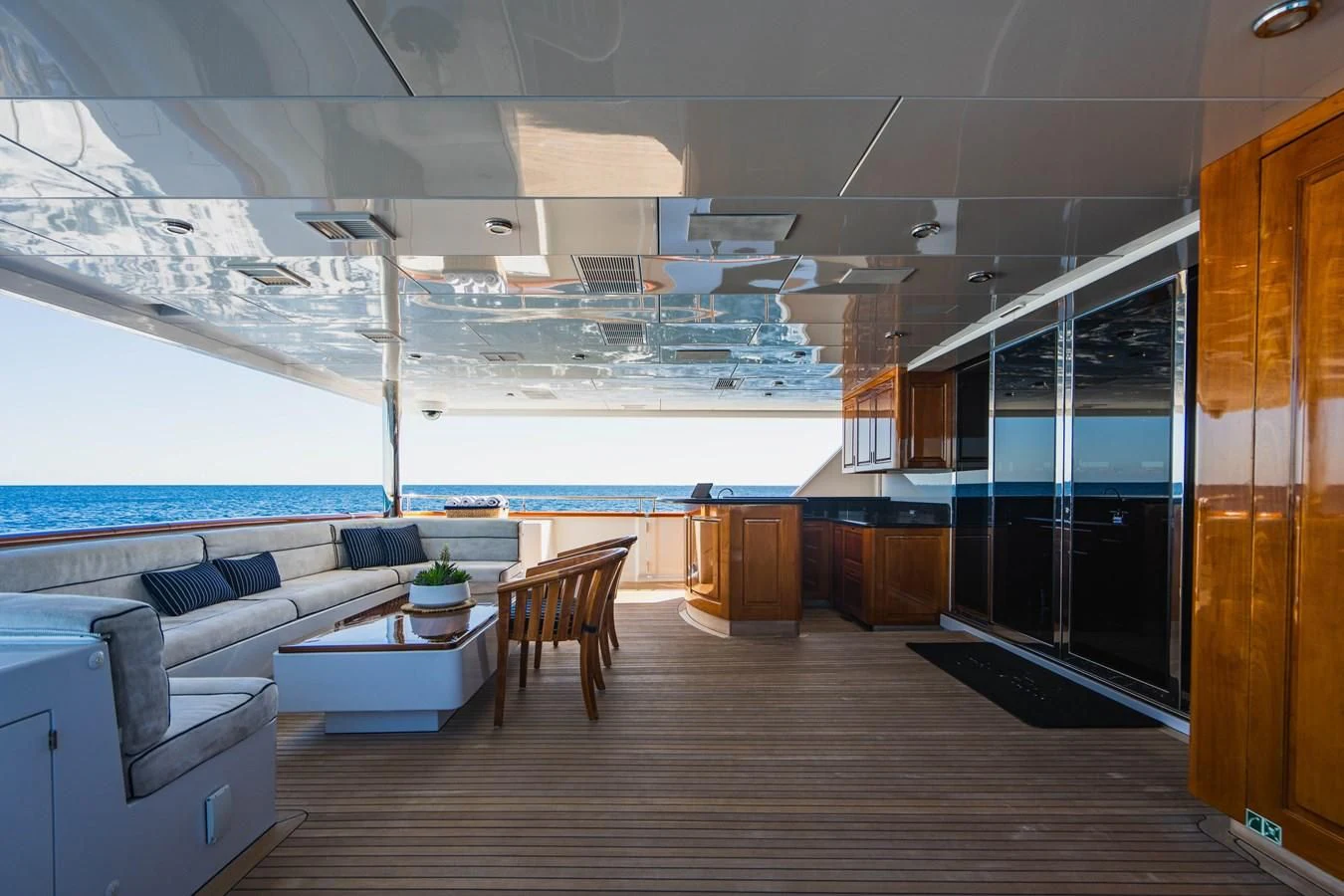 a room with a couch and a table aboard LADY ELAINE Yacht for Charter