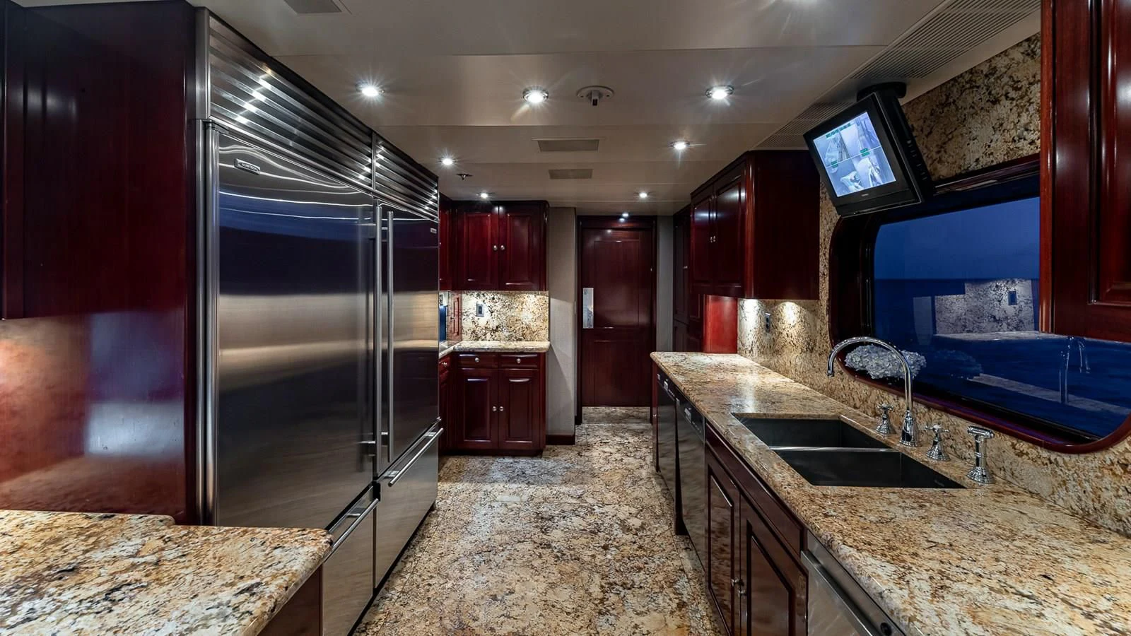 a kitchen with granite counter tops aboard LADY ELAINE Yacht for Charter