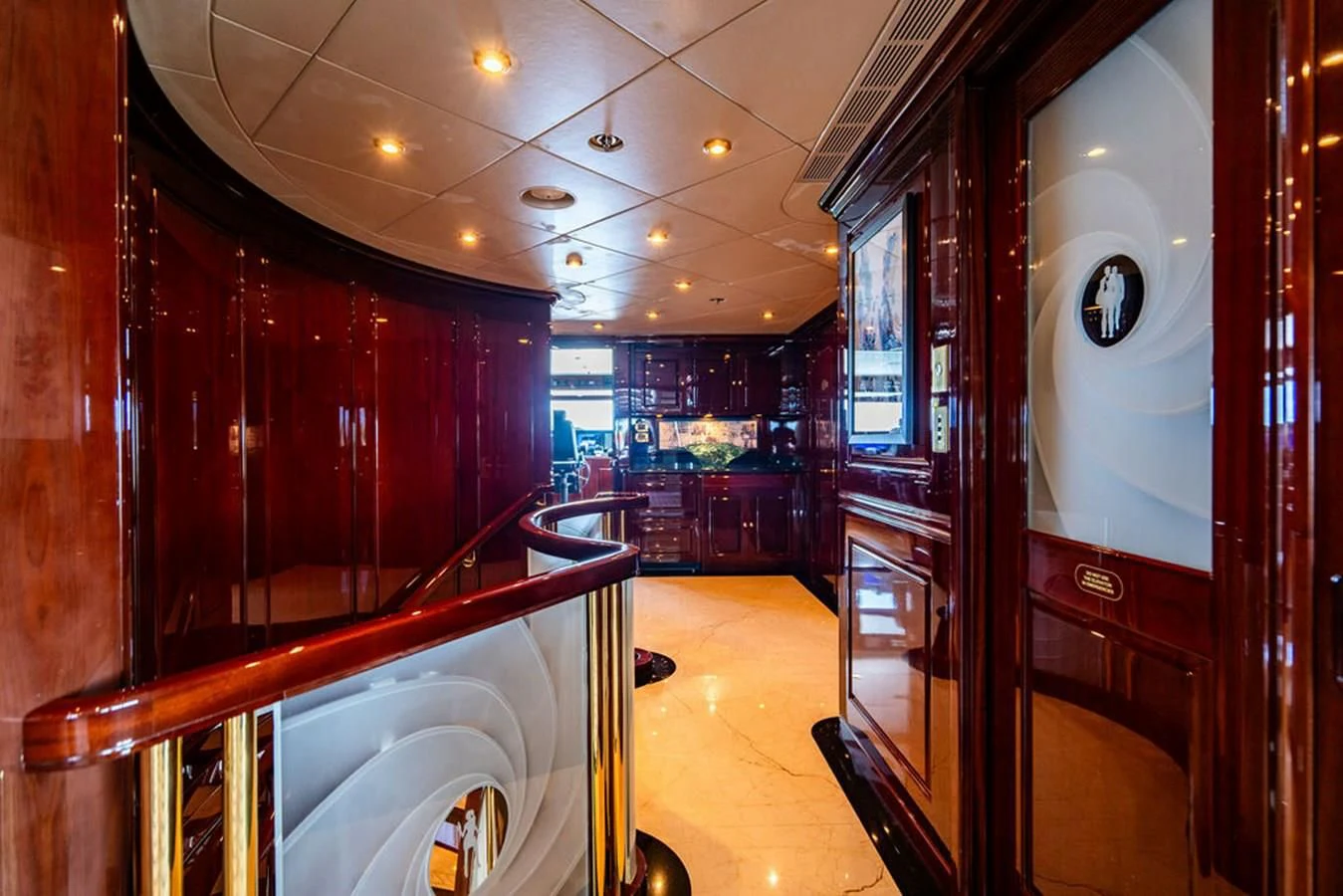 a hallway with a glass door aboard LADY ELAINE Yacht for Charter