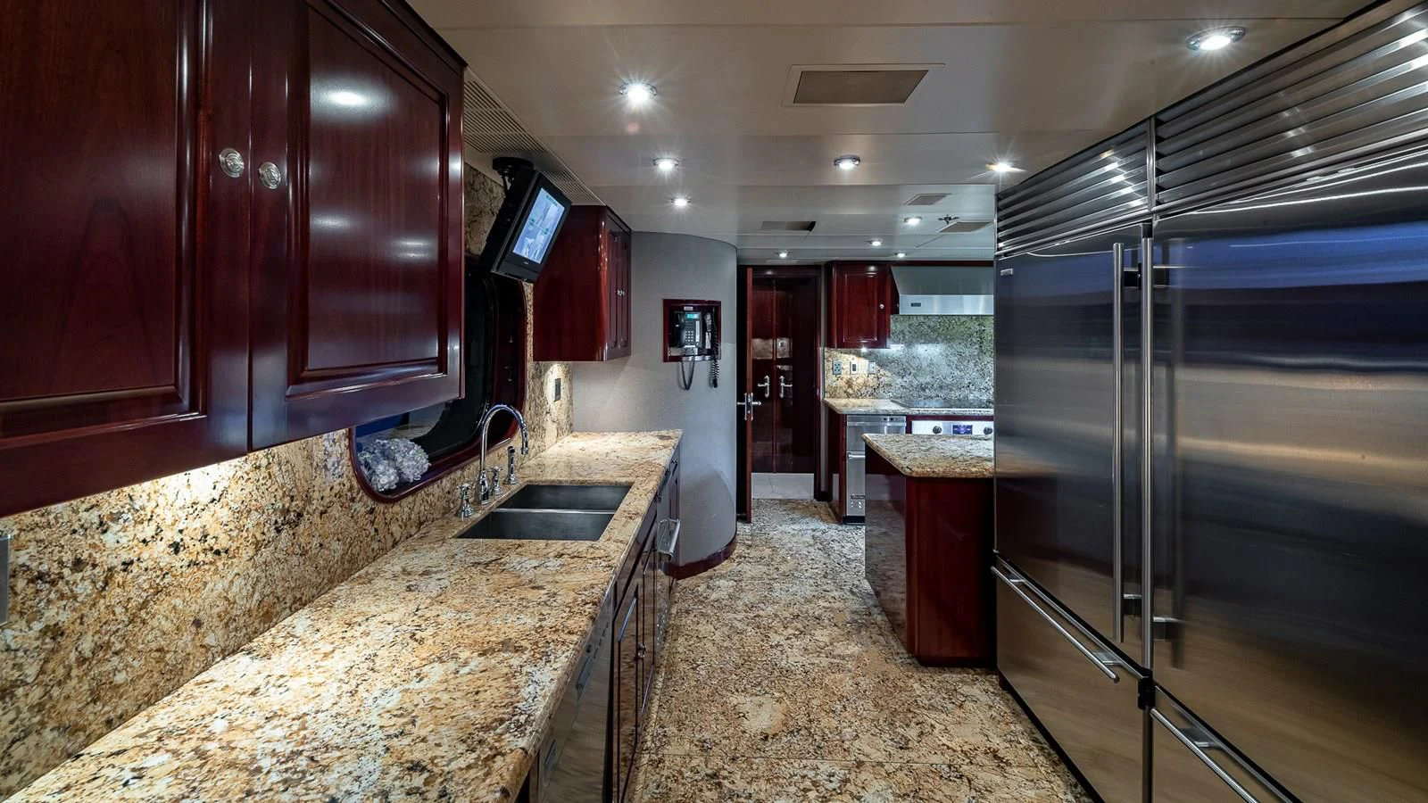 a kitchen with granite counter tops aboard LADY ELAINE Yacht for Charter