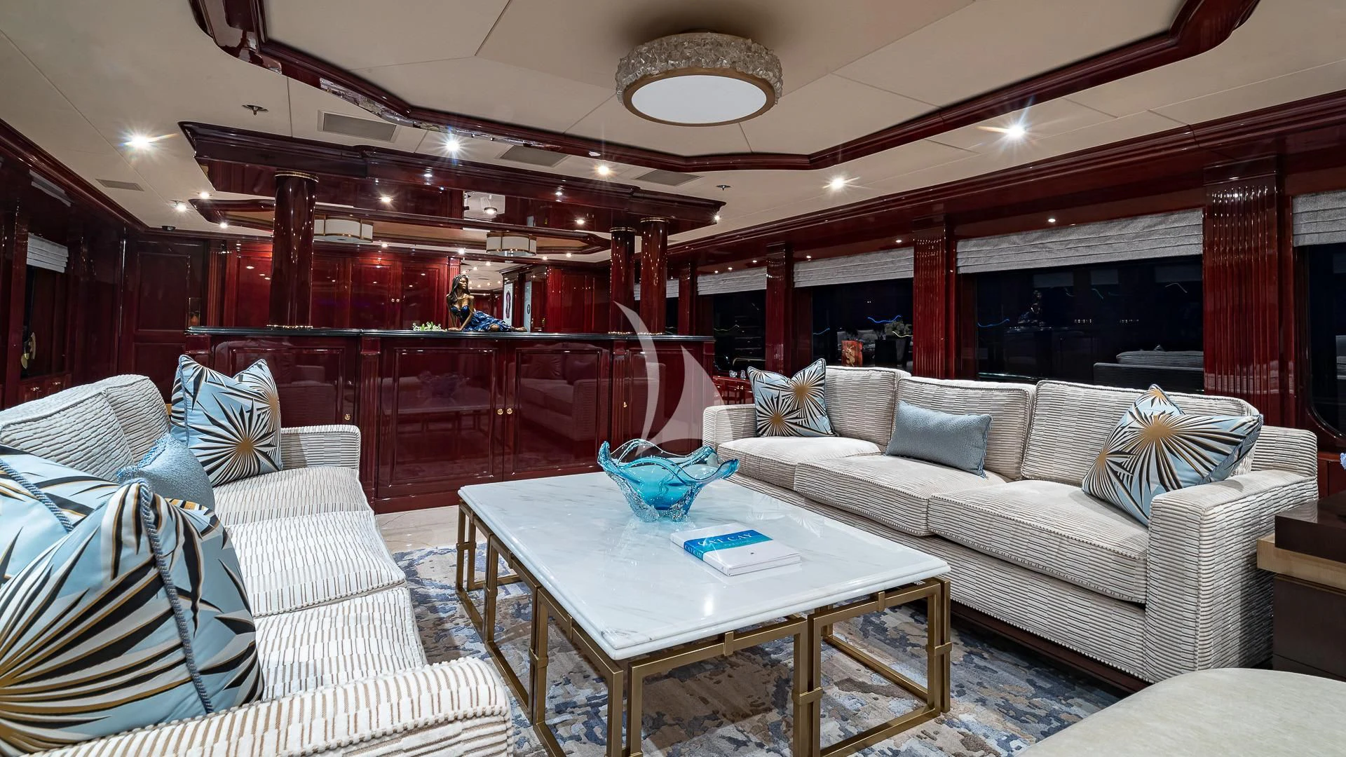 a living room with a couch and a table aboard LADY ELAINE Yacht for Charter