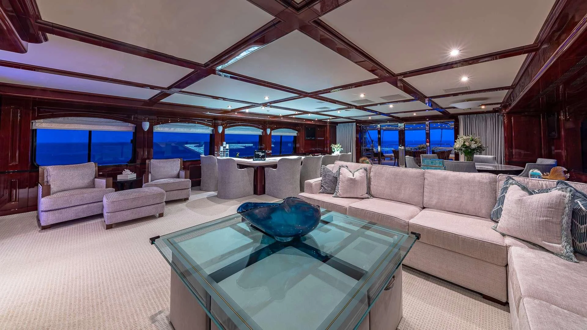 a living room with a large swimming pool aboard LADY ELAINE Yacht for Charter