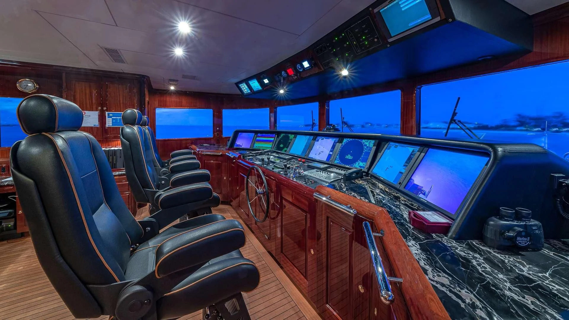 inside of a vehicle with many screens aboard LADY ELAINE Yacht for Charter