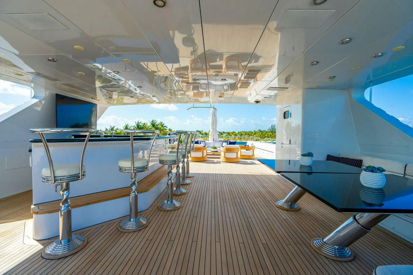 a room with a table and chairs aboard LADY ELAINE Yacht for Charter