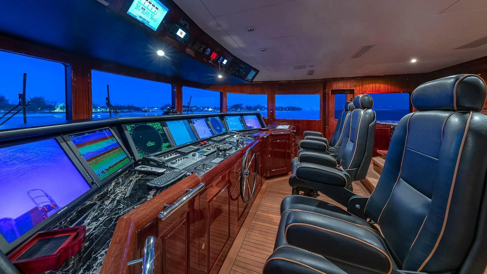 inside of a vehicle with many screens aboard LADY ELAINE Yacht for Charter
