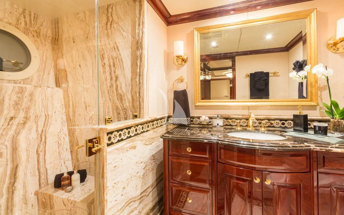 a bathroom with a large mirror aboard LADY ELAINE Yacht for Charter