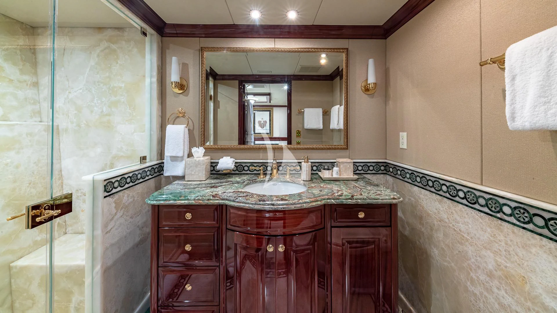 a bathroom with a marble counter top aboard LADY ELAINE Yacht for Charter