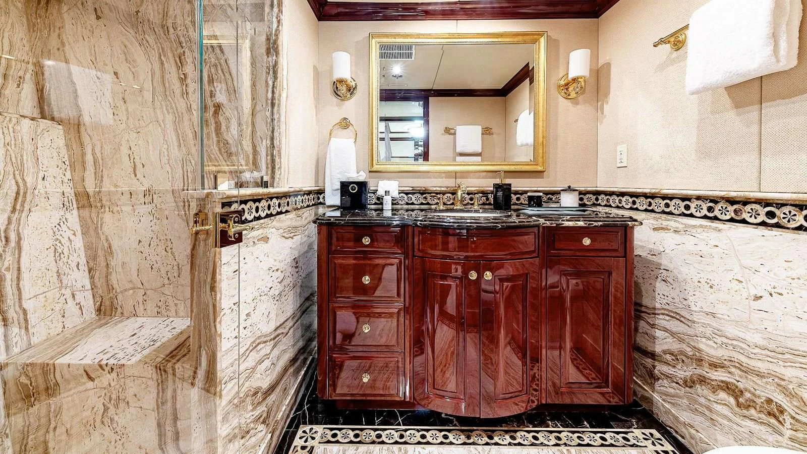 a bathroom with a sink and cabinets aboard LADY ELAINE Yacht for Charter