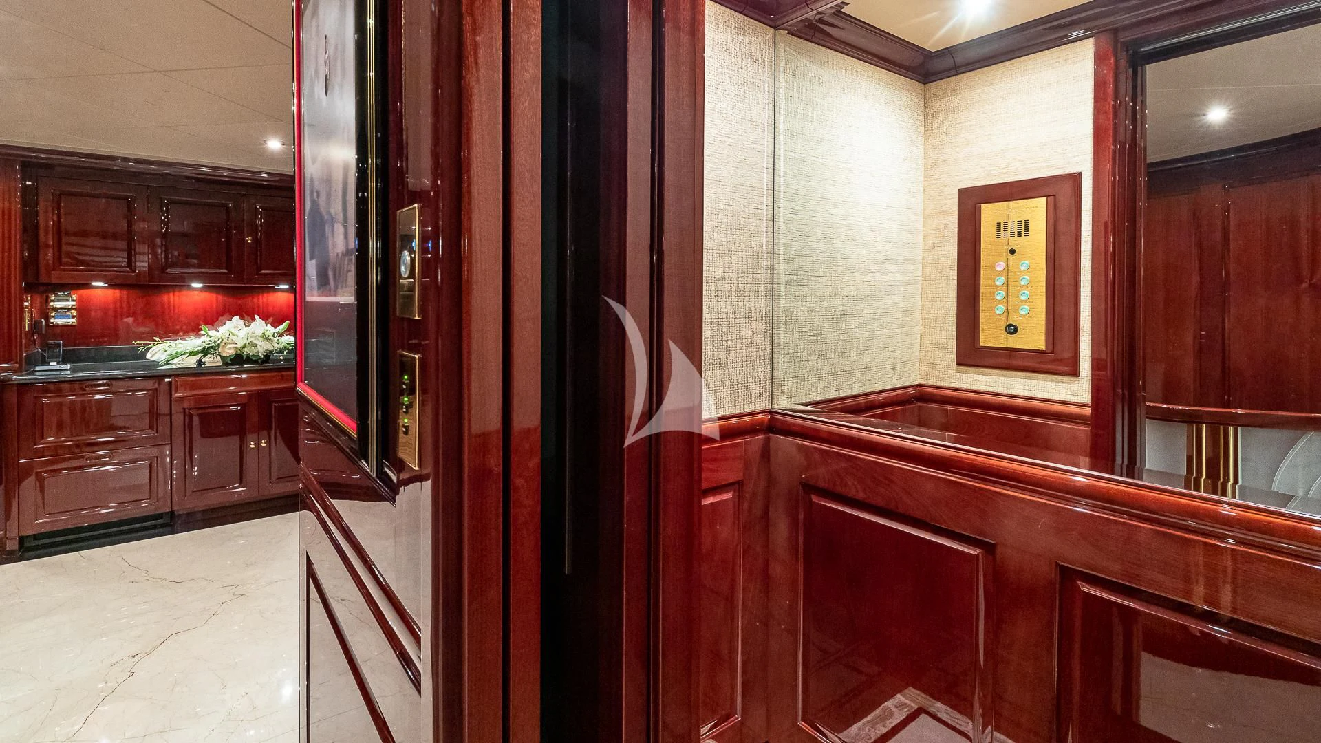 a kitchen with wooden cabinets aboard LADY ELAINE Yacht for Charter