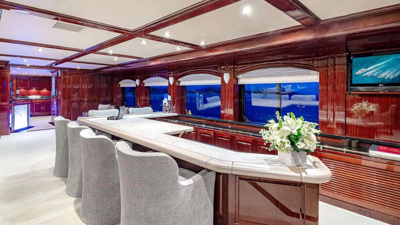 a room with a table and chairs aboard LADY ELAINE Yacht for Charter