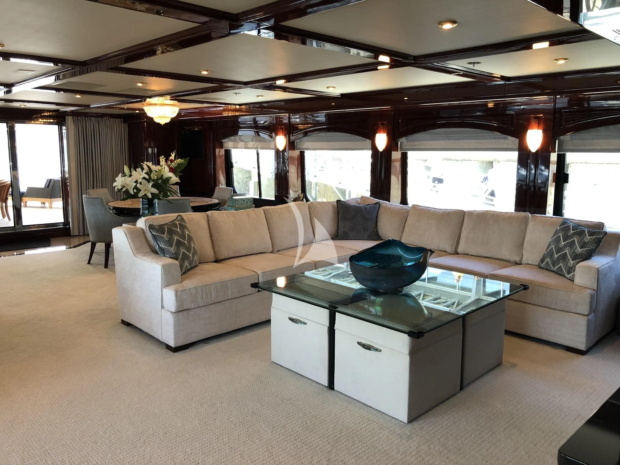 a living room with a couch and a coffee table aboard LADY ELAINE Yacht for Charter