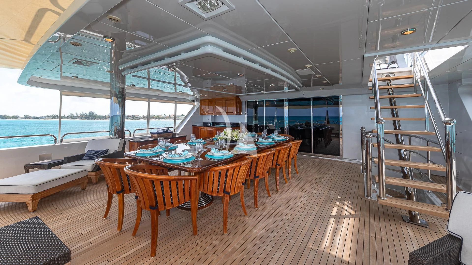 a dining room with a table and chairs aboard LADY ELAINE Yacht for Charter