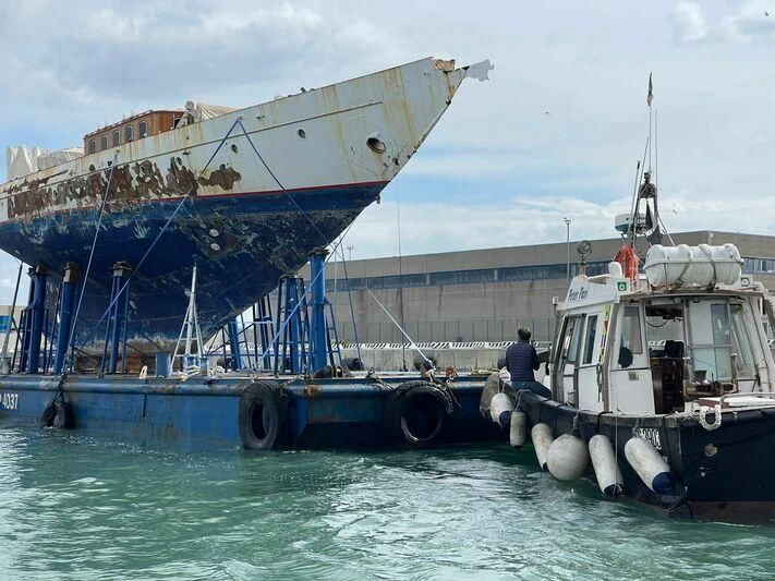 a boat is parked in the water aboard SAKARA Yacht for Sale