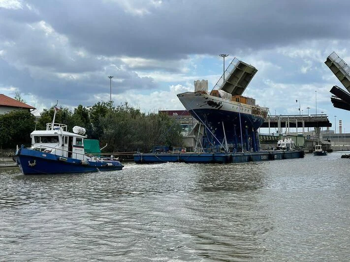 a large boat is moving through a canal aboard SAKARA Yacht for Sale