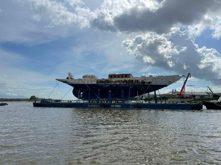 a large ship in the water aboard SAKARA Yacht for Sale