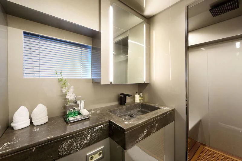 a kitchen with a marble counter top aboard PRIMERO Yacht for Sale