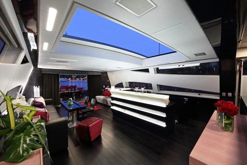 a large white boat in a room aboard PRIMERO Yacht for Sale