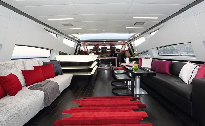 a train with couches and chairs aboard PRIMERO Yacht for Sale