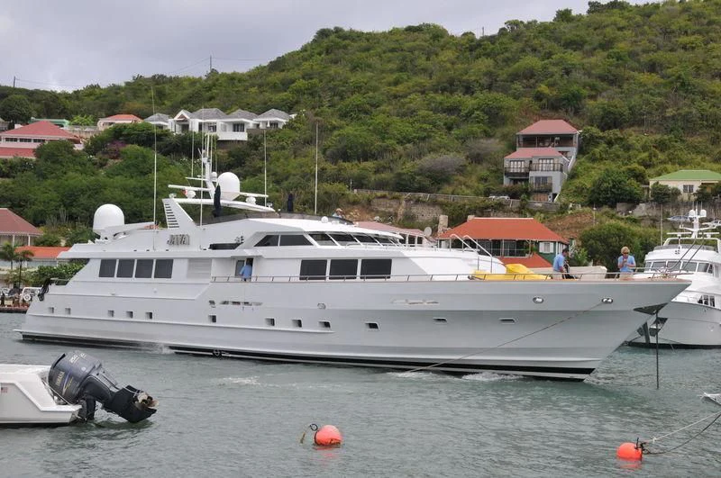 a boat docked at a pier aboard JAVA Yacht for Sale