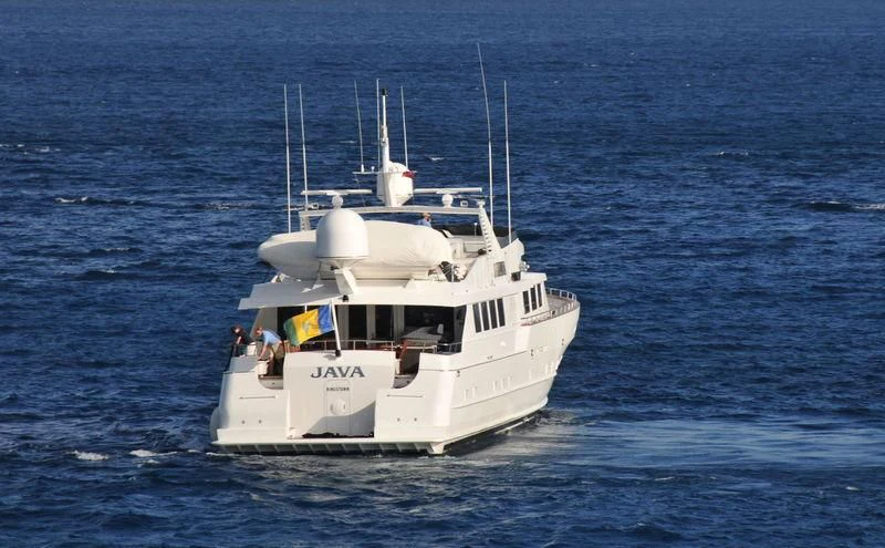 a white boat in the water aboard JAVA Yacht for Sale