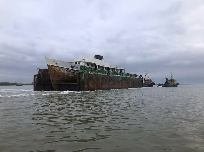 a large ship in the water aboard LLYS HELIG Yacht for Sale