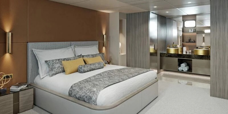 a large bed in a room aboard NOCTURNO Yacht for Sale