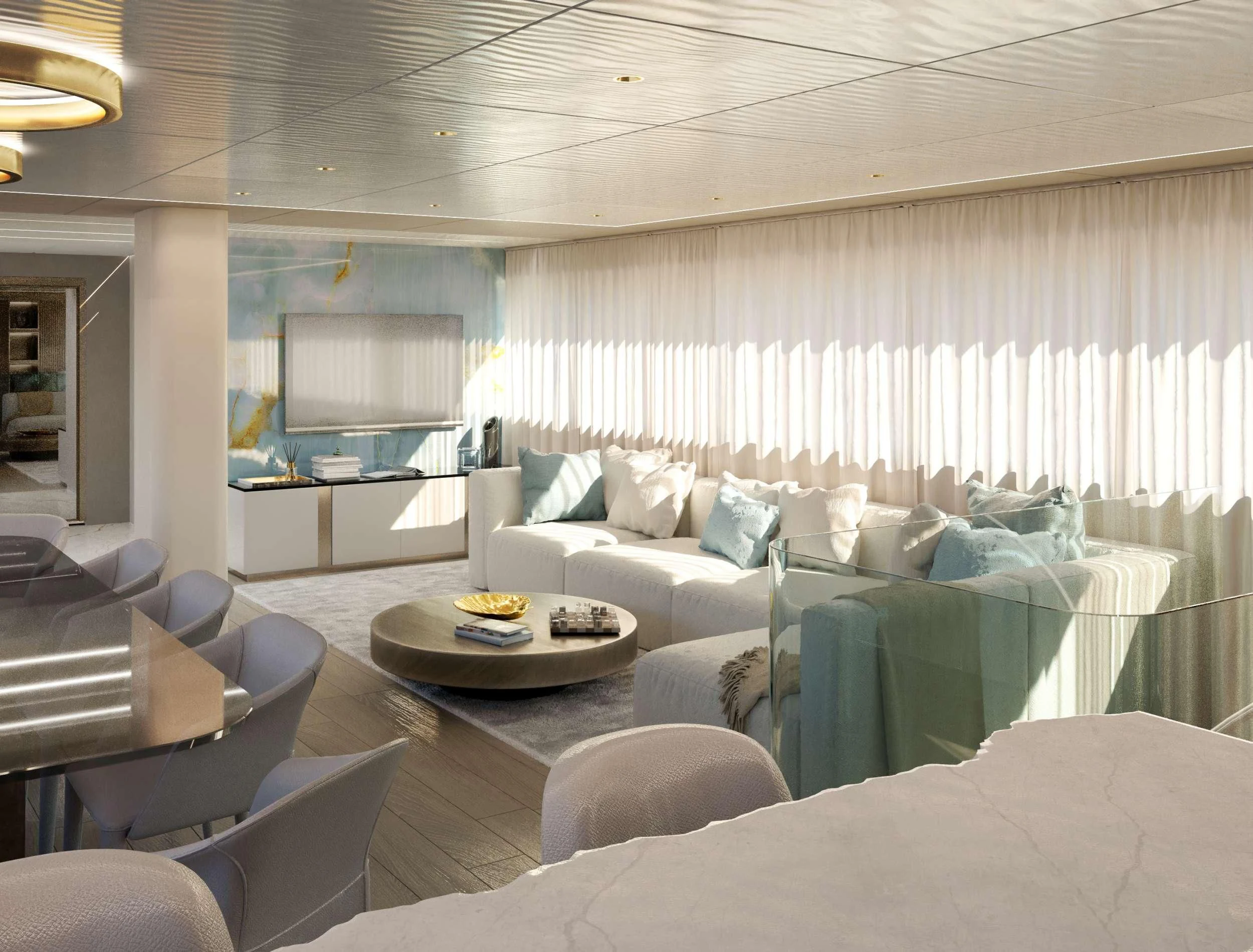 a living room with a couch and a table aboard NOCTURNO Yacht for Sale