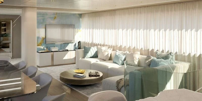 a living room with a couch and a table aboard NOCTURNO Yacht for Sale