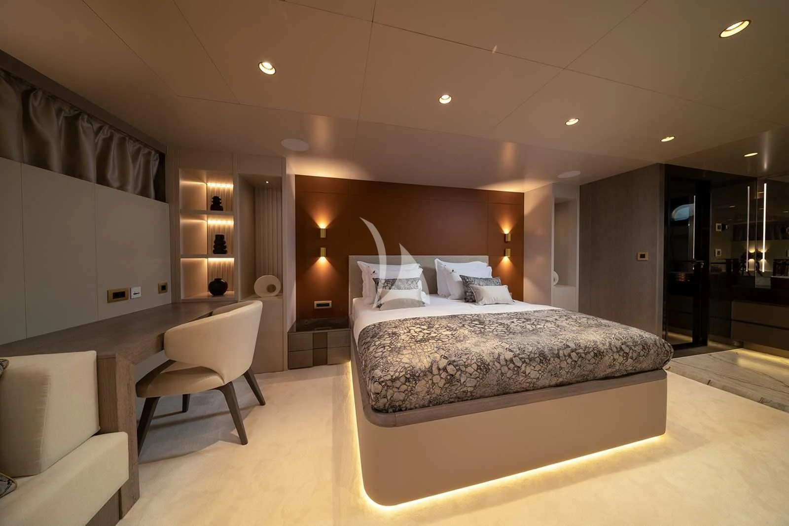 a large bedroom with a large bed aboard NOCTURNO Yacht for Sale