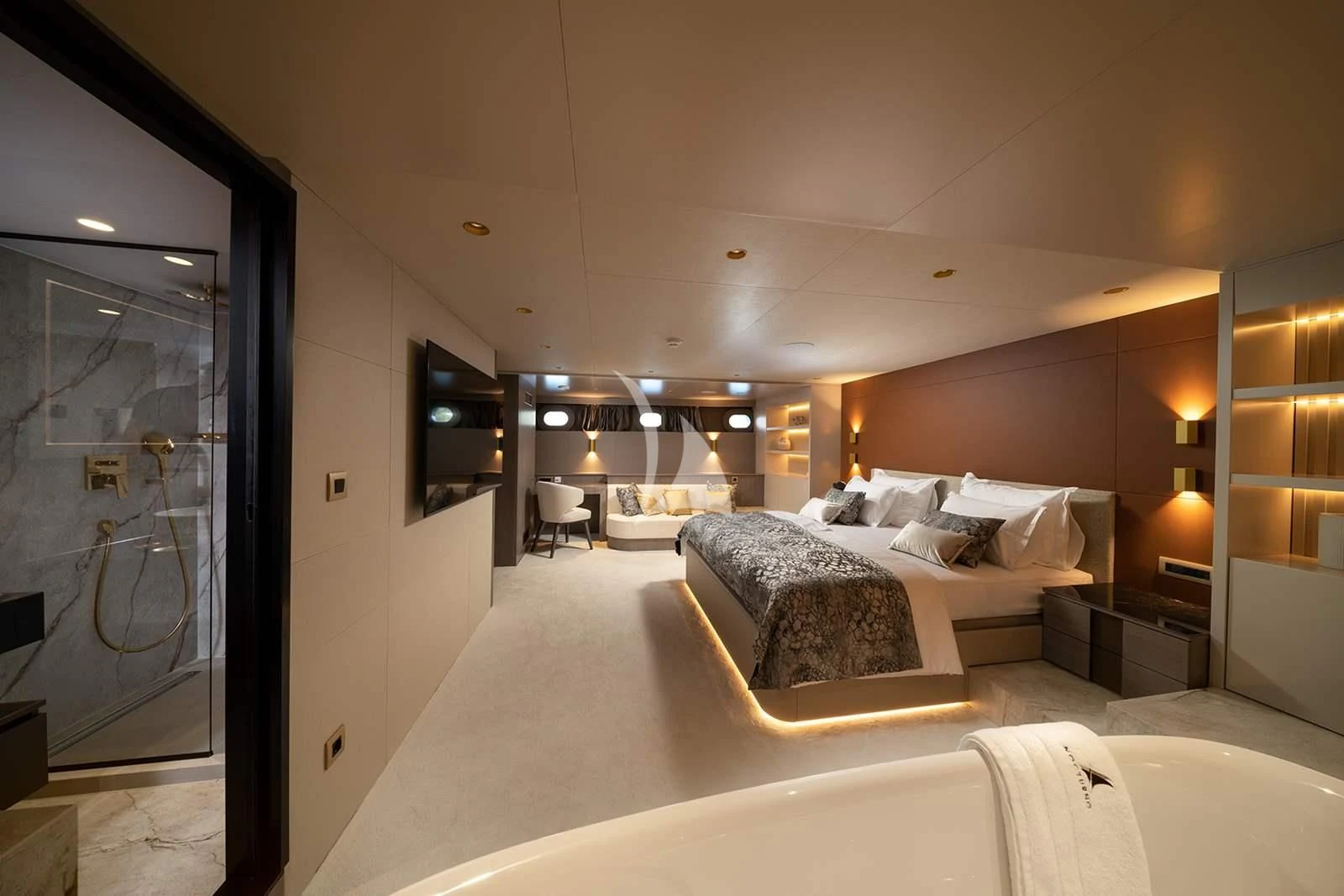 a bedroom with a large bed aboard NOCTURNO Yacht for Sale