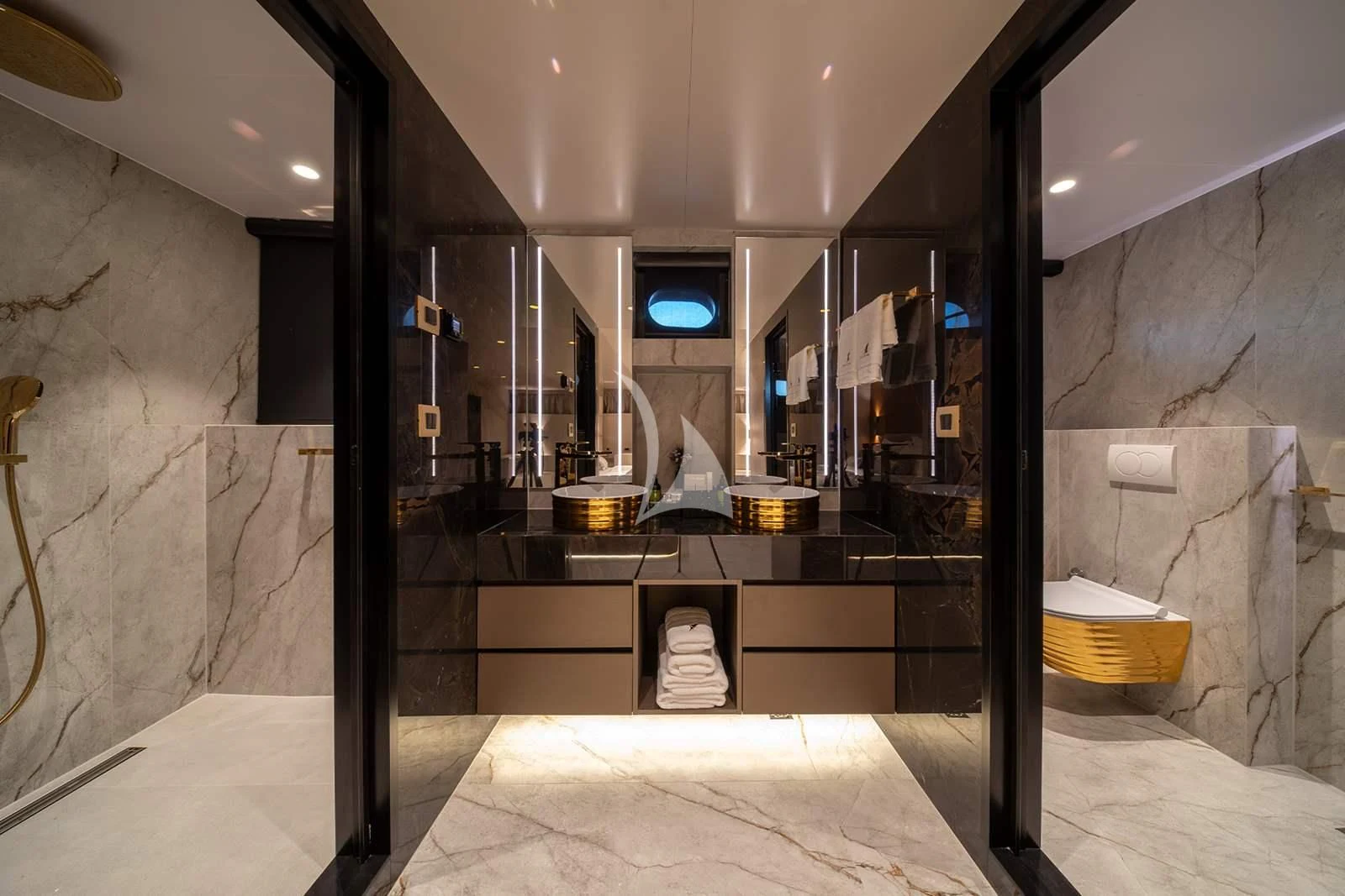 a bathroom with a glass shower aboard NOCTURNO Yacht for Sale