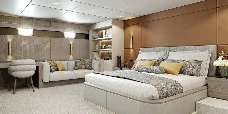 a large bedroom with a bed and a couch aboard NOCTURNO Yacht for Sale