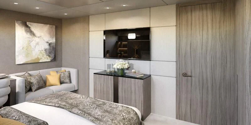 a bedroom with a bed and a desk aboard NOCTURNO Yacht for Sale