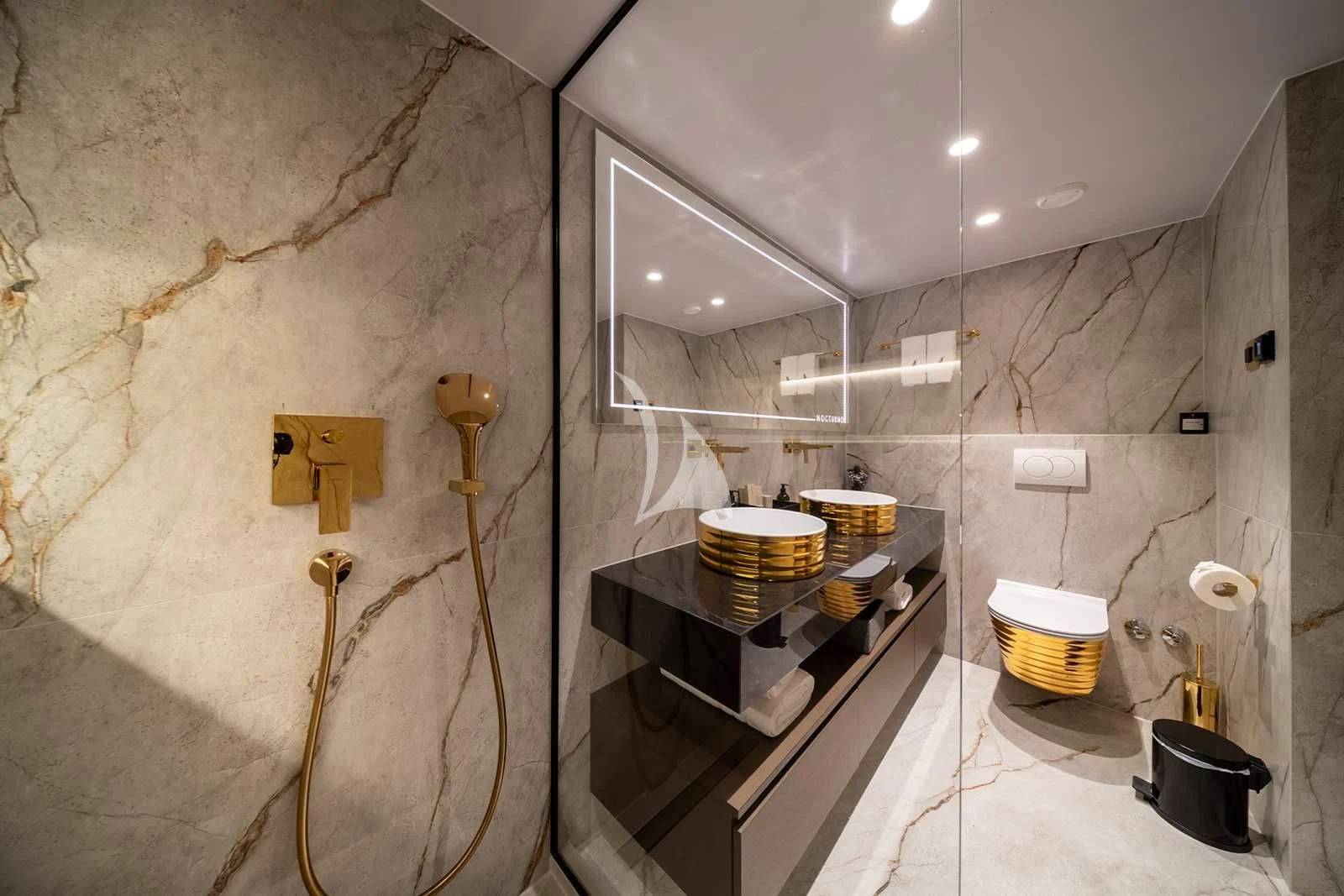a bathroom with a sink and a mirror aboard NOCTURNO Yacht for Sale