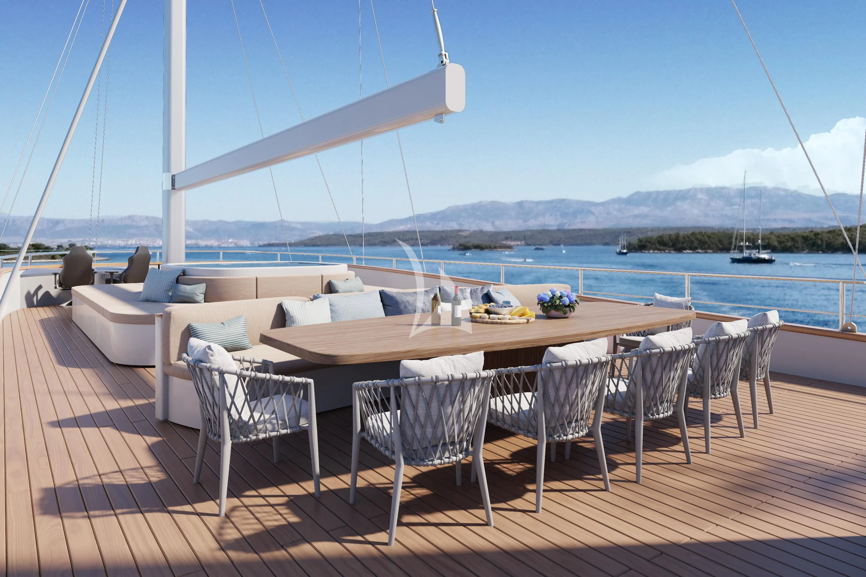 a table set for a meal on a deck overlooking a body of water aboard NOCTURNO Yacht for Sale