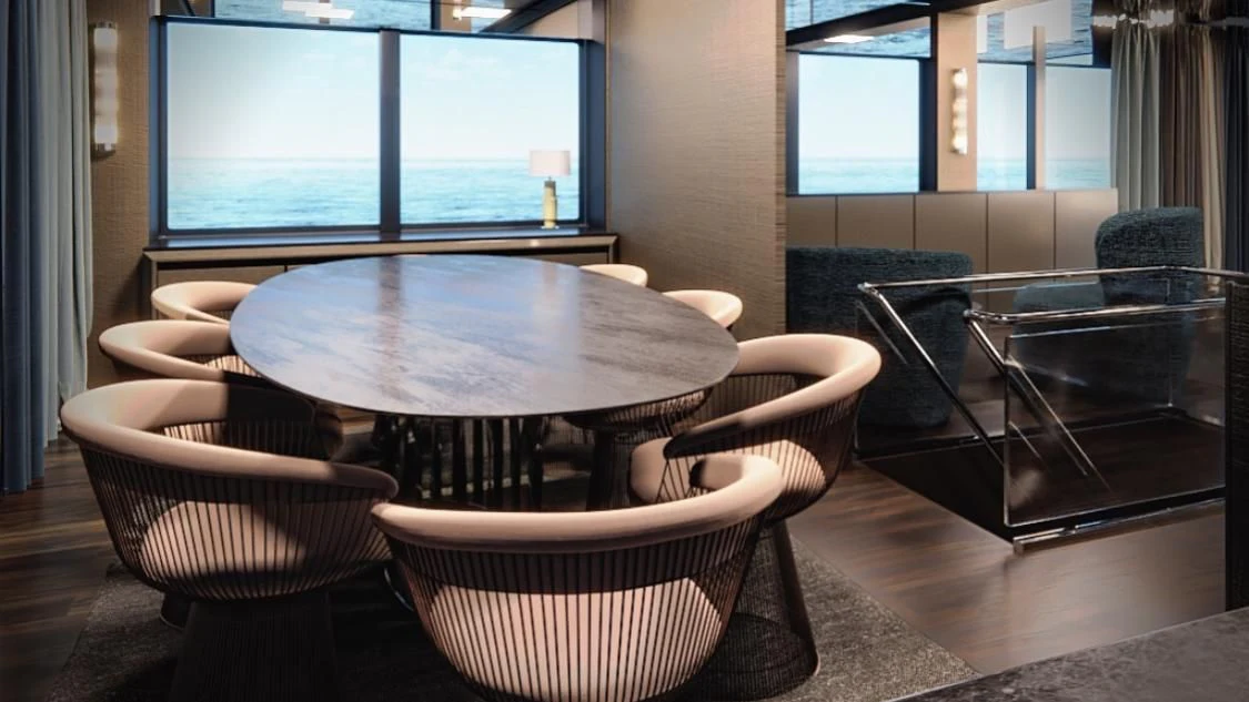 a table and chairs in a room aboard KOKONUT'S WALLY Yacht for Sale