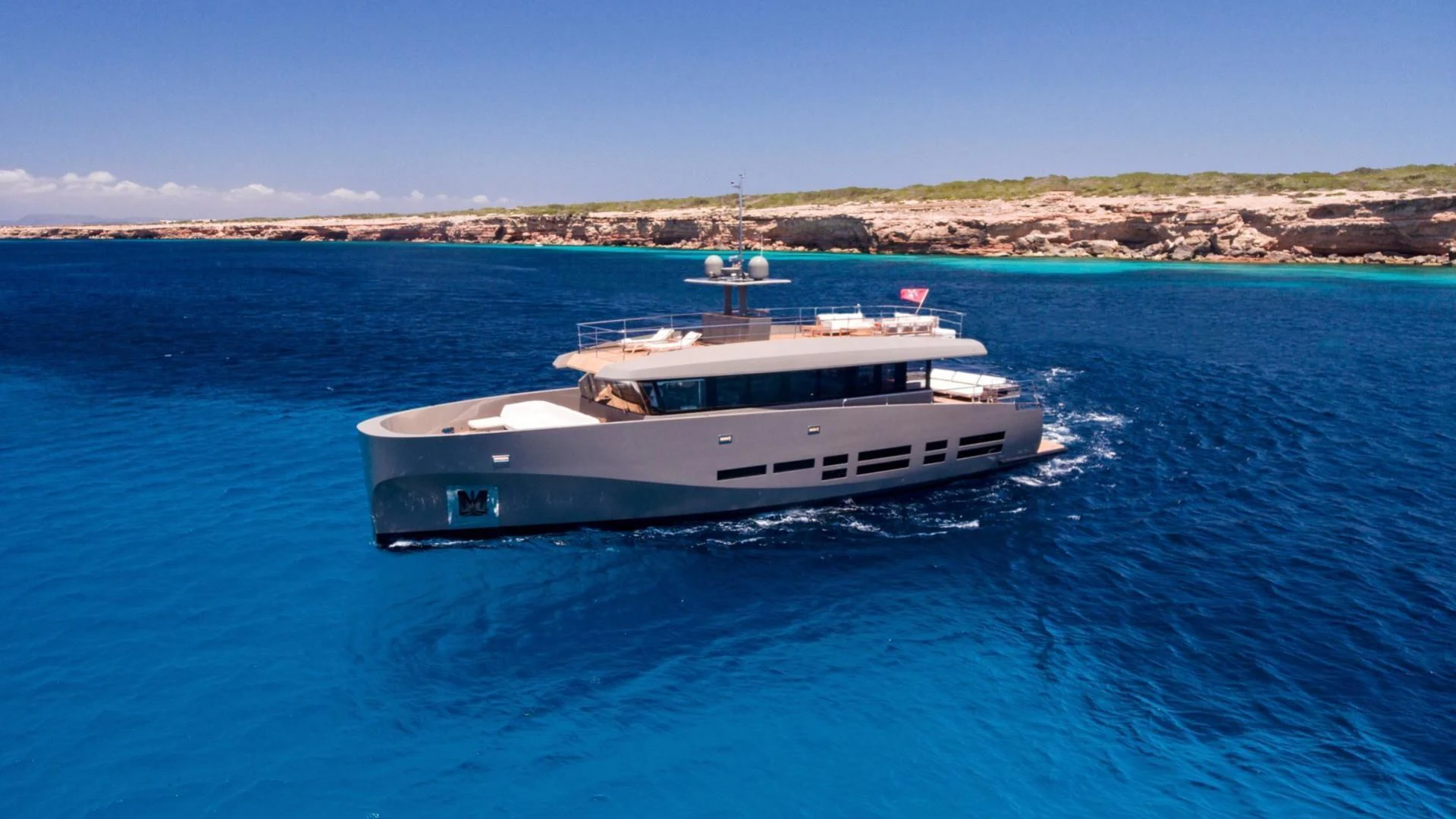 a boat in the water aboard KOKONUT'S WALLY Yacht for Sale